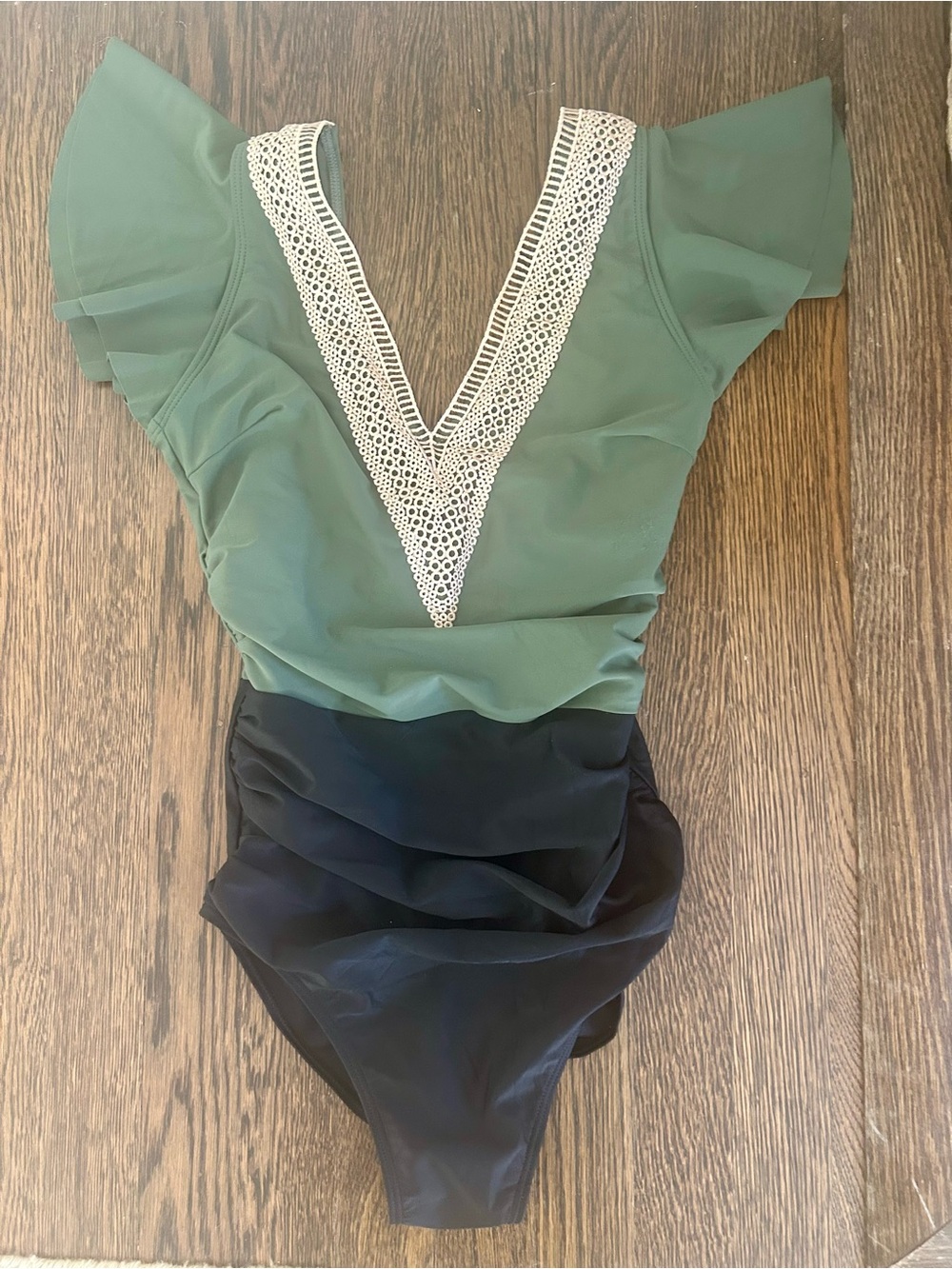 Women’s tummy control ruched one piece bathing suit. BRAND NEW NEVER WORN
